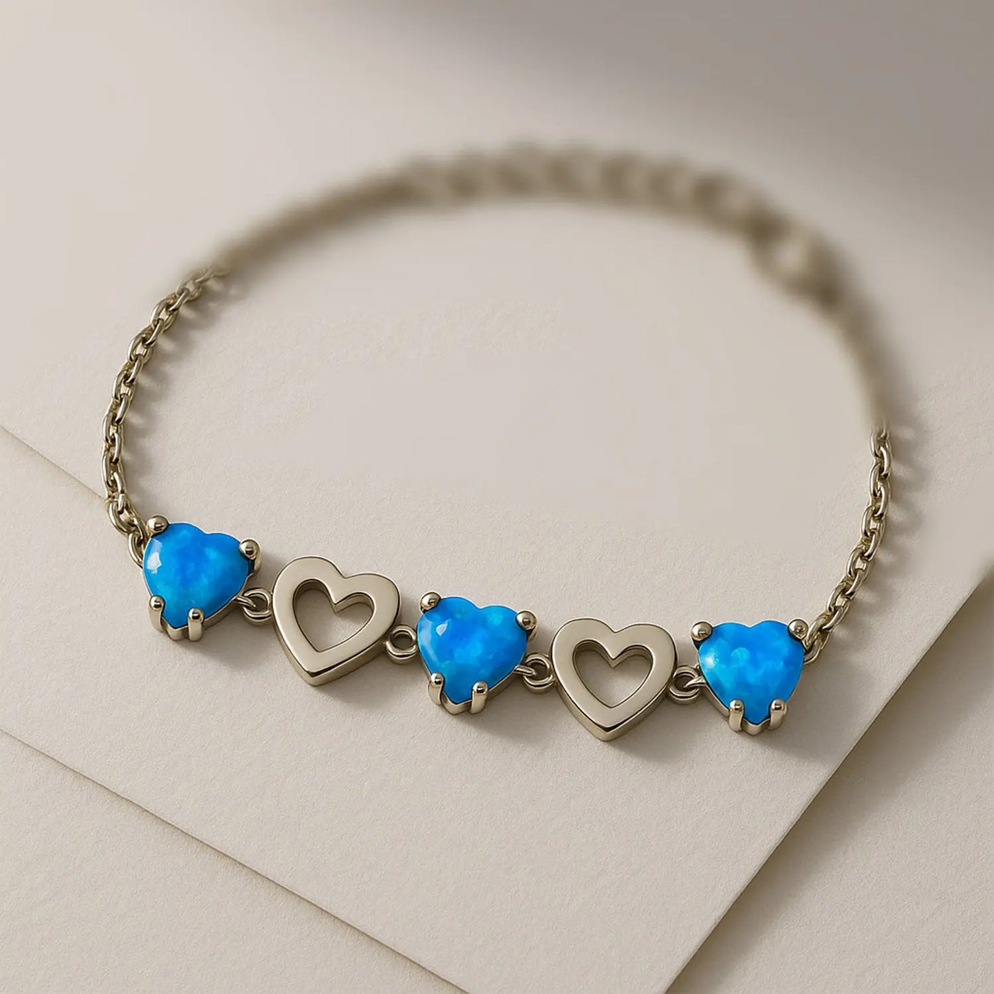 925 sterling silver heart bracelet with blue heart-shaped stones, elegant minimalist bracelet for women